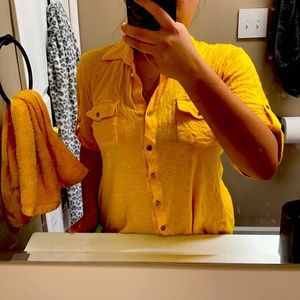 short sleeve shirt. buttons do come undone.